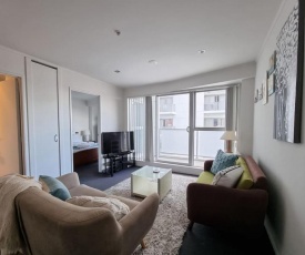 Spacious 2BR CBD Apartment with Balcony and Kitchen